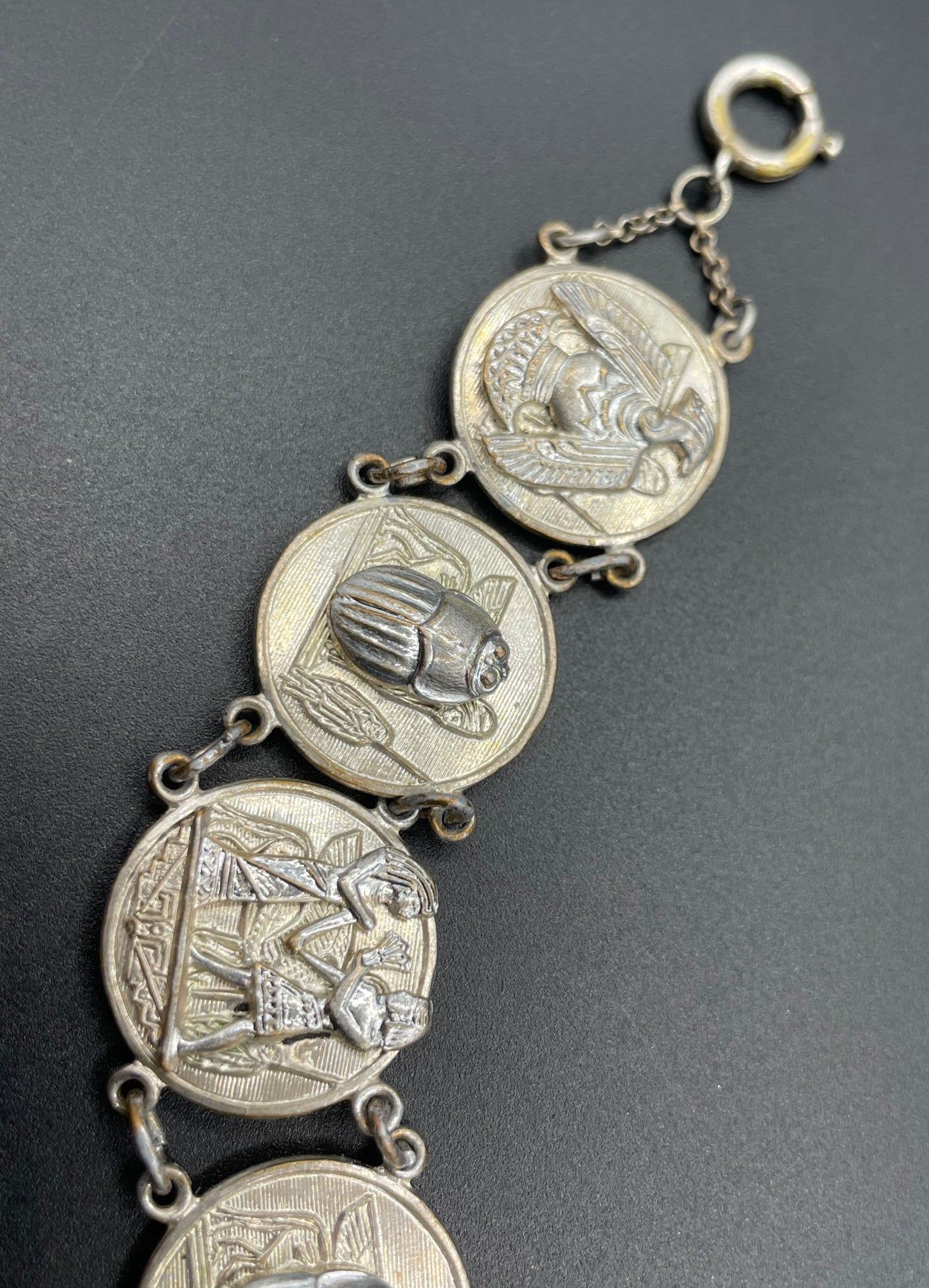 Vintage Egyptian revival scarab, pharaoh and hieroglyphics design silver tone circular panel bracelet, rubbing to silver tone