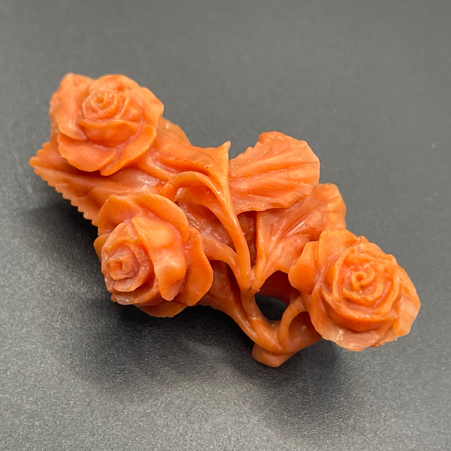 Antique Victorian carved coral and yellow metal rose flower design brooch (with pendant converter), possibly unmarked gold pin, 11 grams