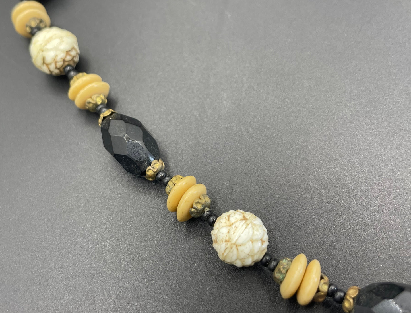 Vintage Art Deco Czech glass bead necklace, moulded glass and faceted glass beads in black, cream and white uranium glass