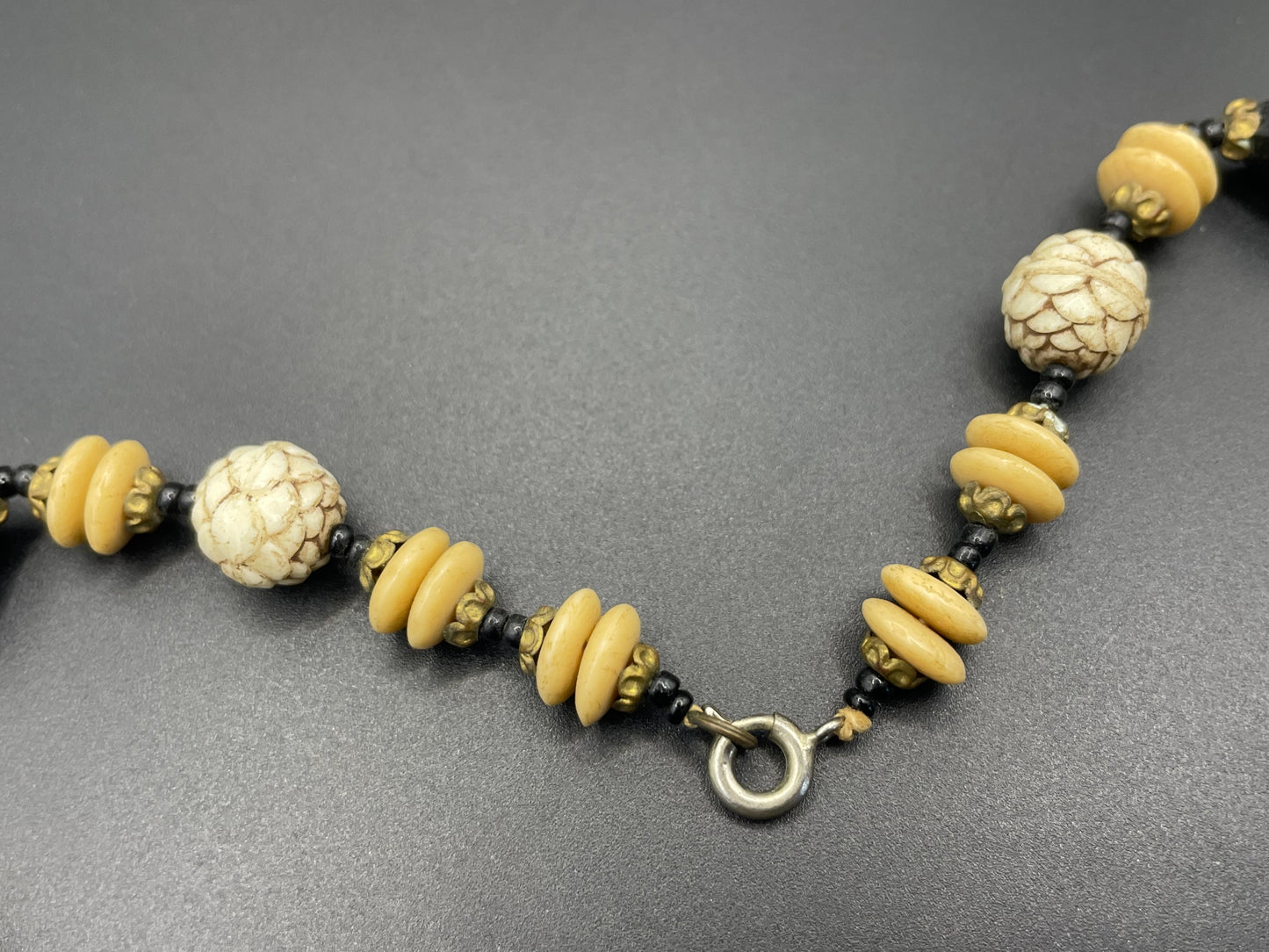 Vintage Art Deco Czech glass bead necklace, moulded glass and faceted glass beads in black, cream and white uranium glass