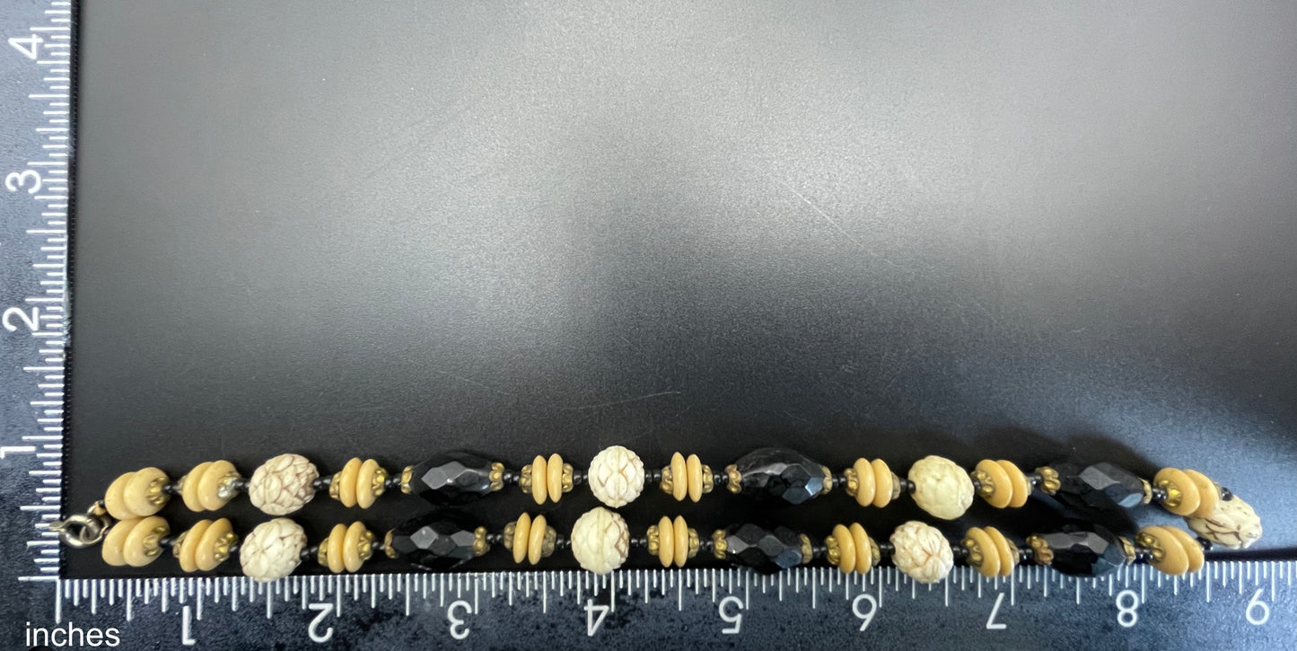 Vintage Art Deco Czech glass bead necklace, moulded glass and faceted glass beads in black, cream and white uranium glass