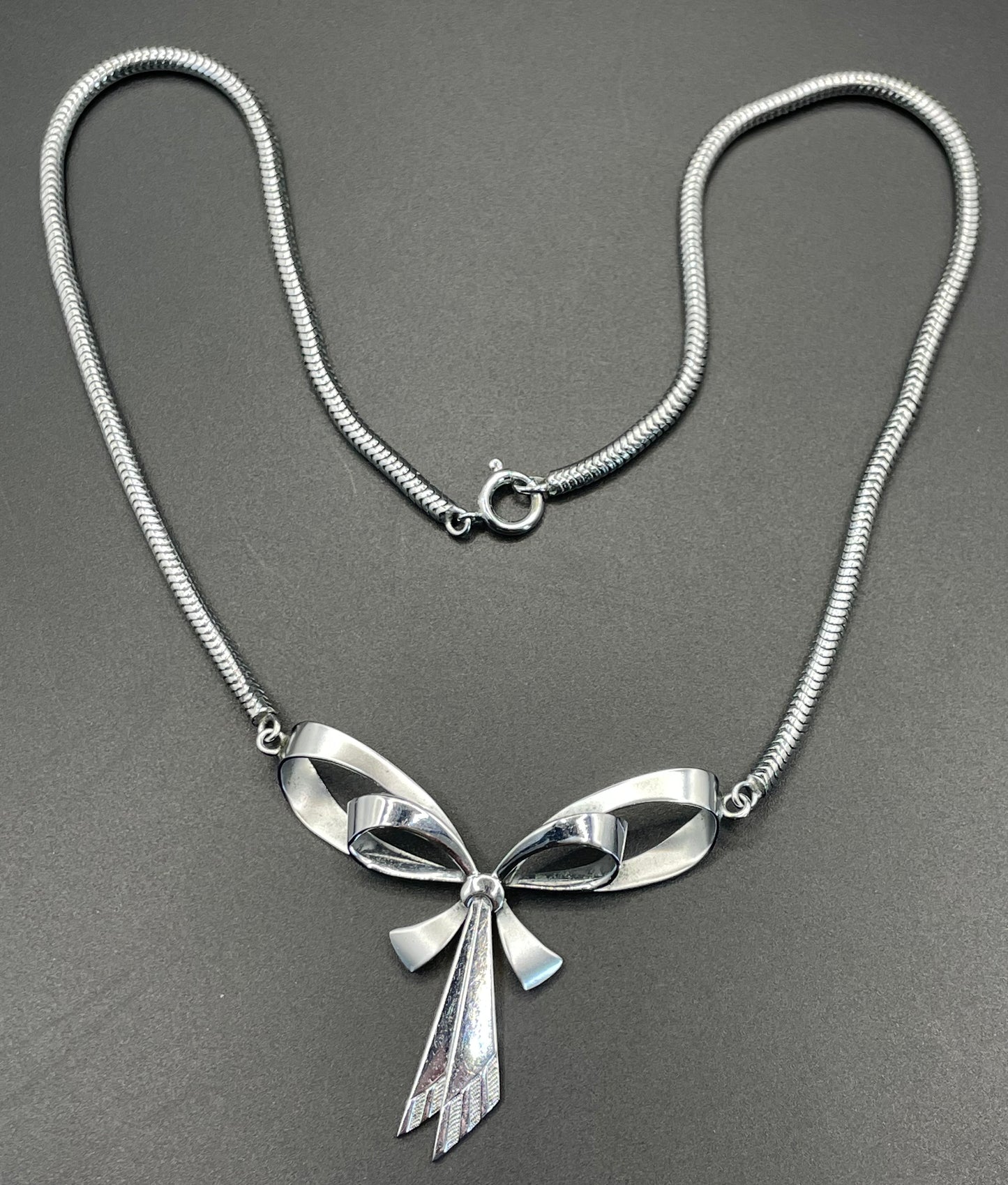 Vintage Jakob Bengel Art Deco machine age chrome snake chain bow necklace