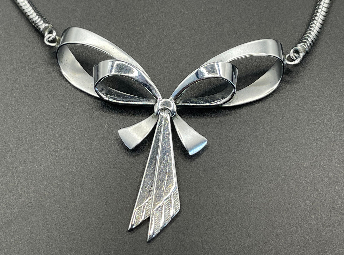 Vintage Jakob Bengel Art Deco machine age chrome snake chain bow necklace