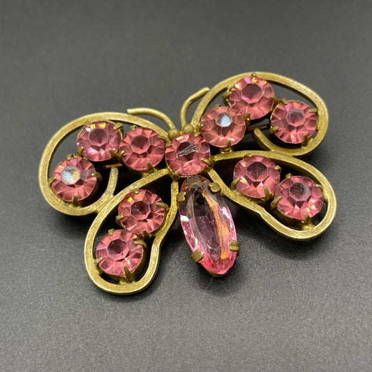 Vintage Art Deco Czech butterfly brooch, pink glass rhinestones, set open-backed in antique gold tone