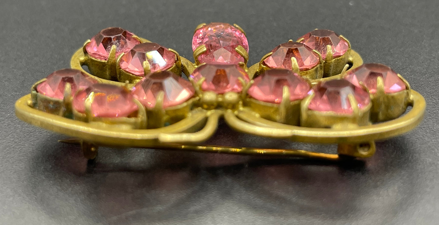 Vintage Art Deco Czech butterfly brooch, pink glass rhinestones, set open-backed in antique gold tone