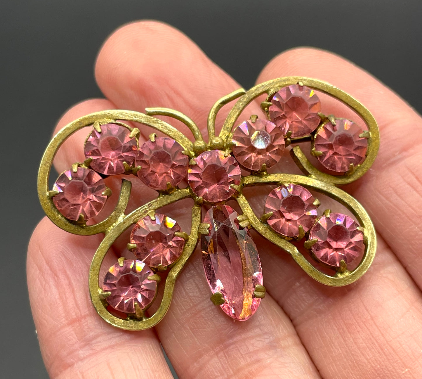 Vintage Art Deco Czech butterfly brooch, pink glass rhinestones, set open-backed in antique gold tone