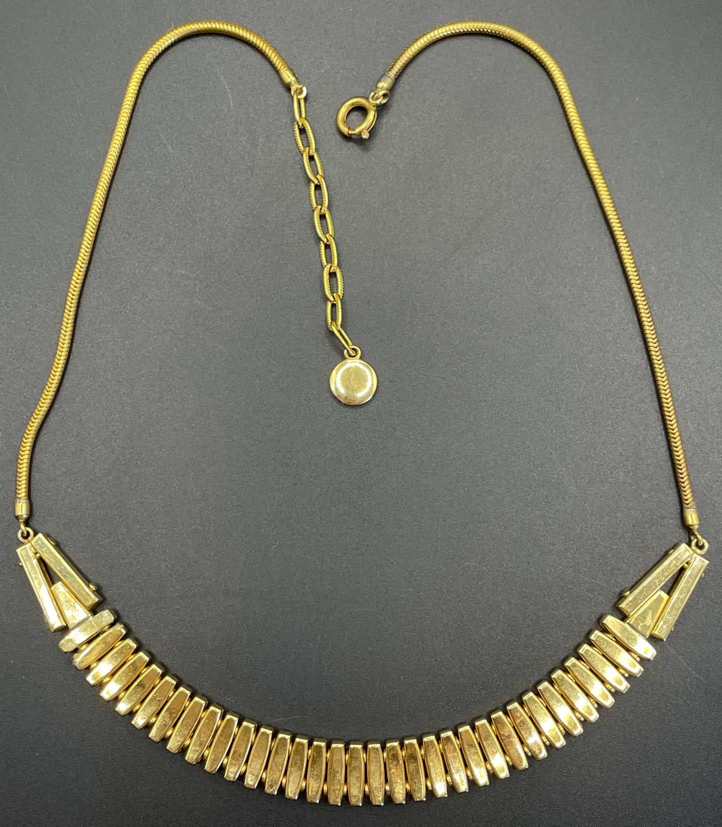 Vintage unsigned Esha Randel by Schreiber & Hiller Art Deco emerald green and clear paste rhinestone gold tone gilt machine age necklace
