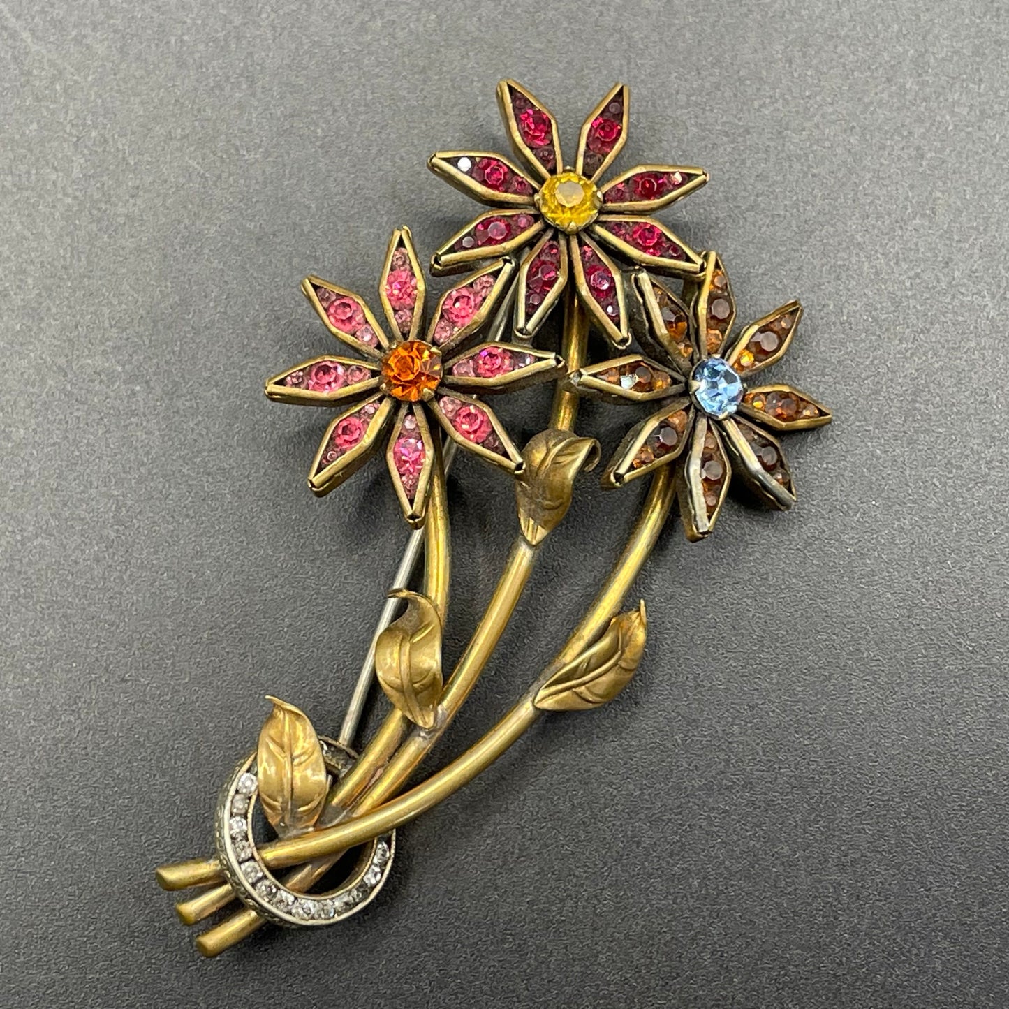 Vintage Schreiber & Hiller (unsigned) flower brooch, Art Deco channel set red, pink, orange, yellow, blue and clear paste rhinestones