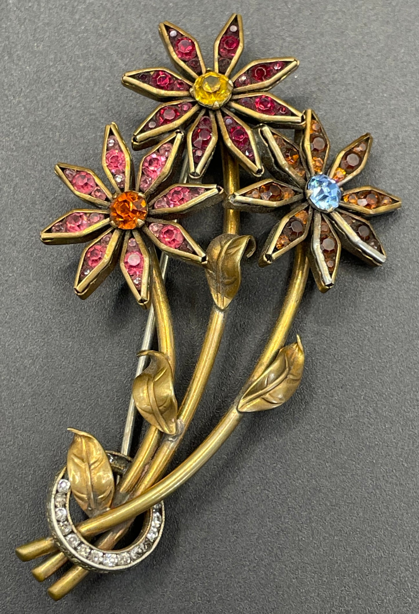 Vintage Schreiber & Hiller (unsigned) flower brooch, Art Deco channel set red, pink, orange, yellow, blue and clear paste rhinestones
