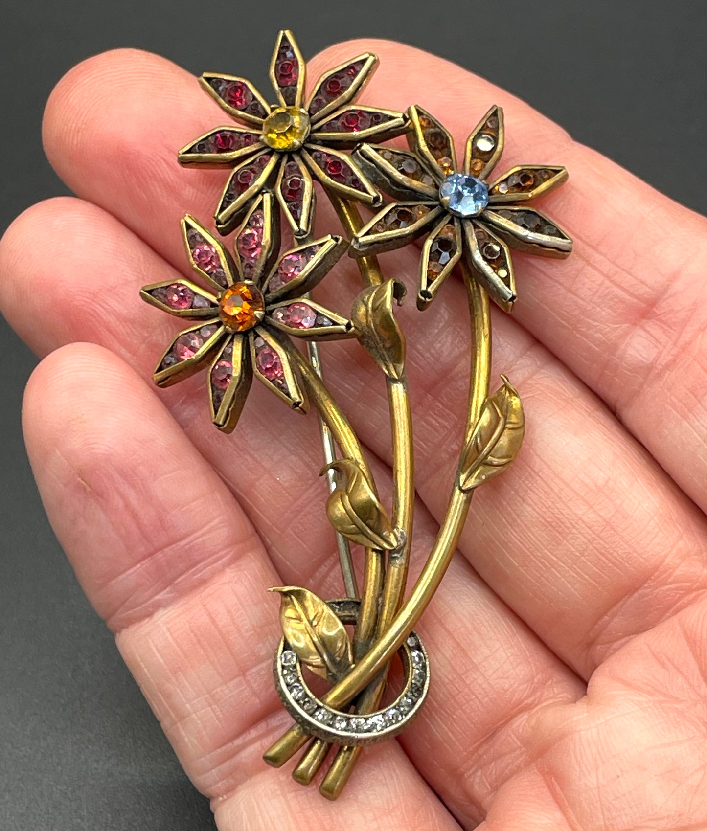 Vintage Schreiber & Hiller (unsigned) flower brooch, Art Deco channel set red, pink, orange, yellow, blue and clear paste rhinestones