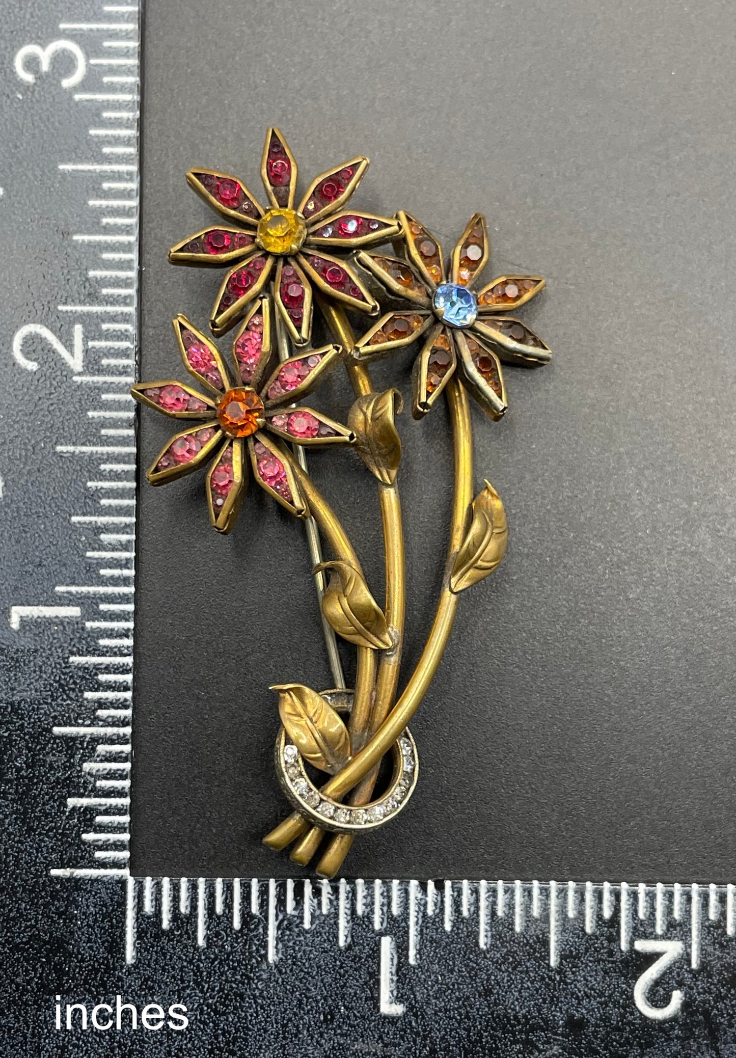 Vintage Schreiber & Hiller (unsigned) flower brooch, Art Deco channel set red, pink, orange, yellow, blue and clear paste rhinestones