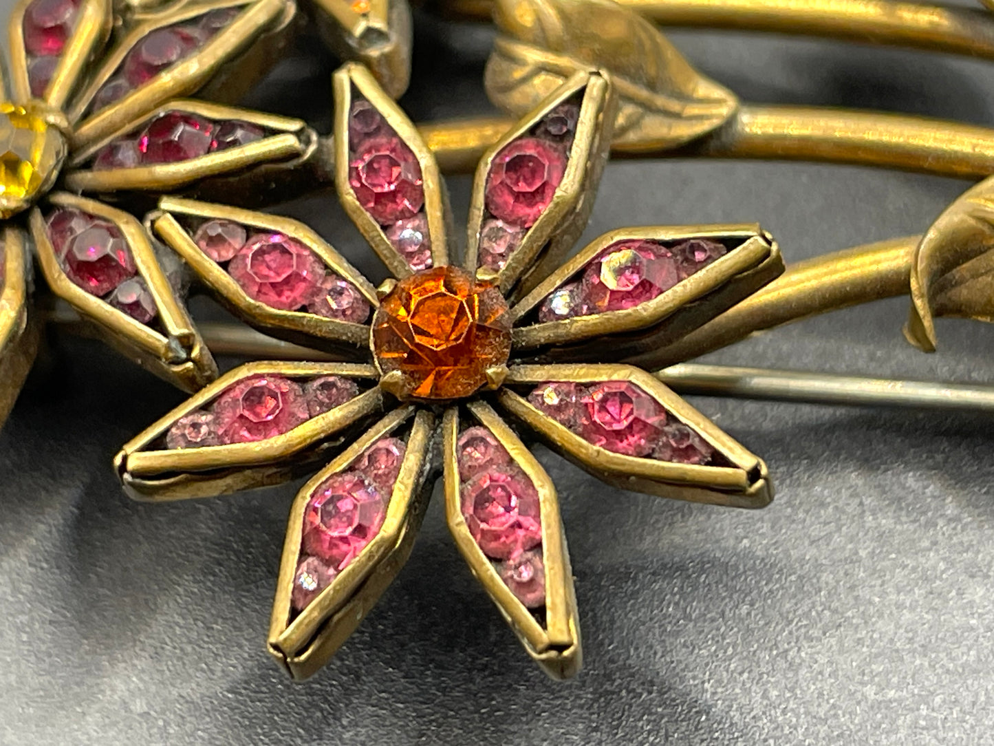 Vintage Schreiber & Hiller (unsigned) flower brooch, Art Deco channel set red, pink, orange, yellow, blue and clear paste rhinestones