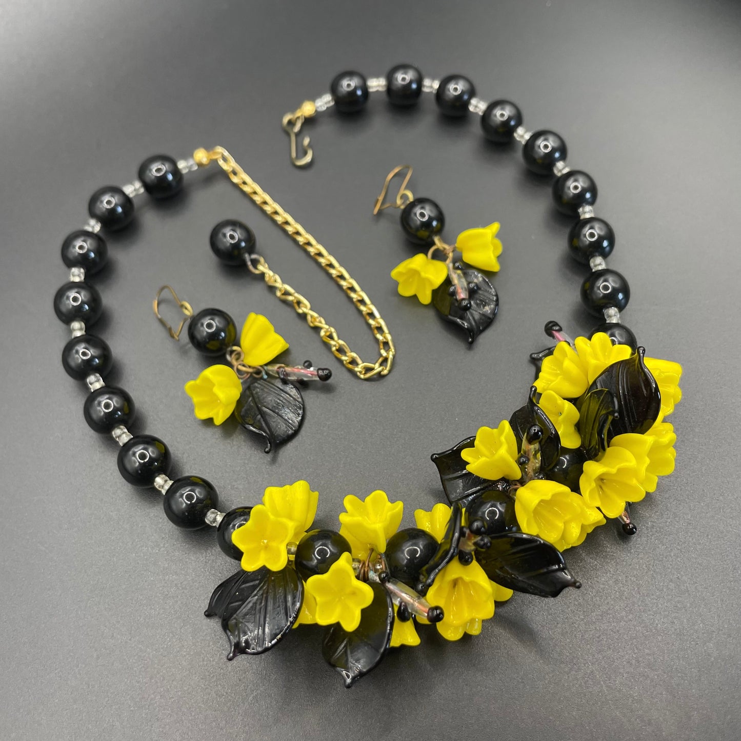 Vintage Art Deco glass flower and leaf necklace and earrings set (pierced ears) - unusual black and yellow colours