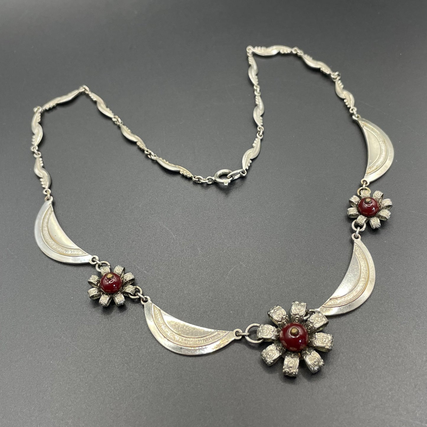 Vintage Louis Rousselet Art Deco machine age silver tone / chrome and dark red glass bead flower design necklace