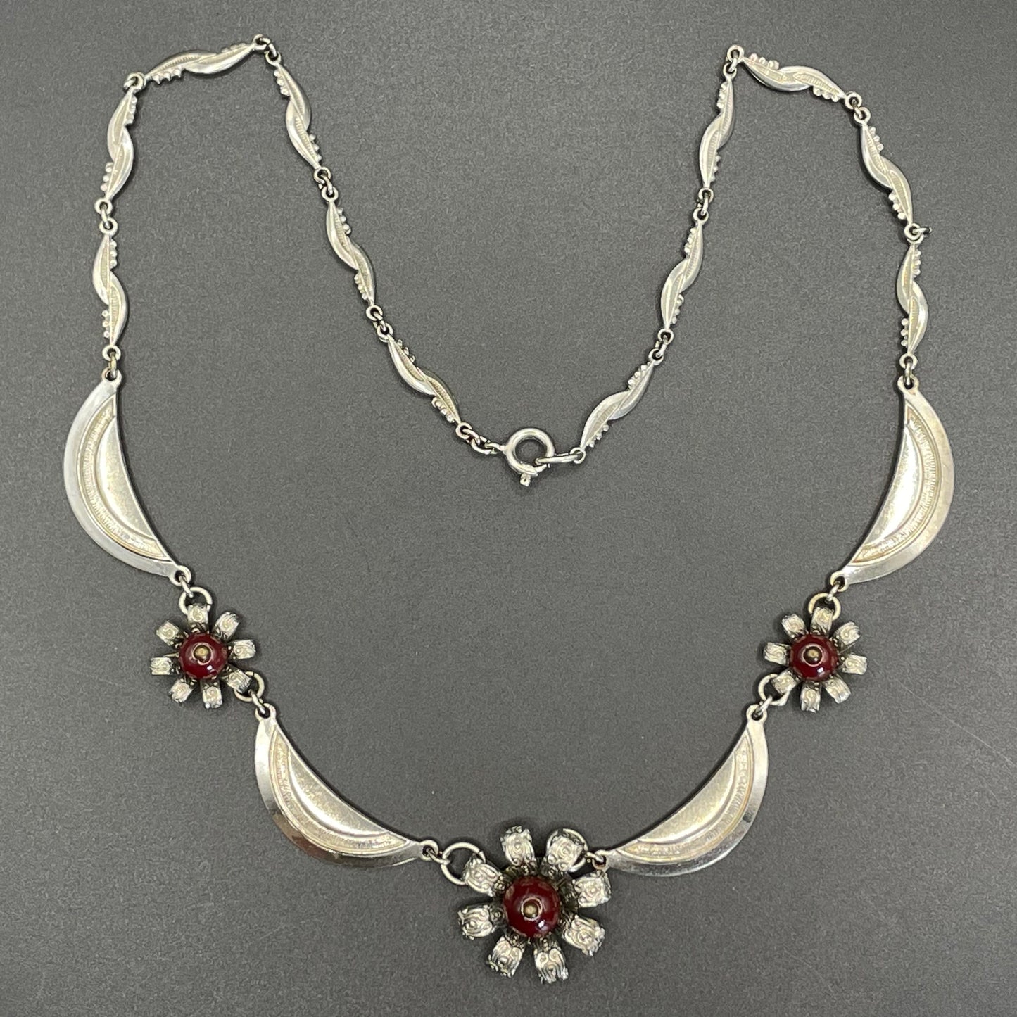 Vintage Louis Rousselet Art Deco machine age silver tone / chrome and dark red glass bead flower design necklace