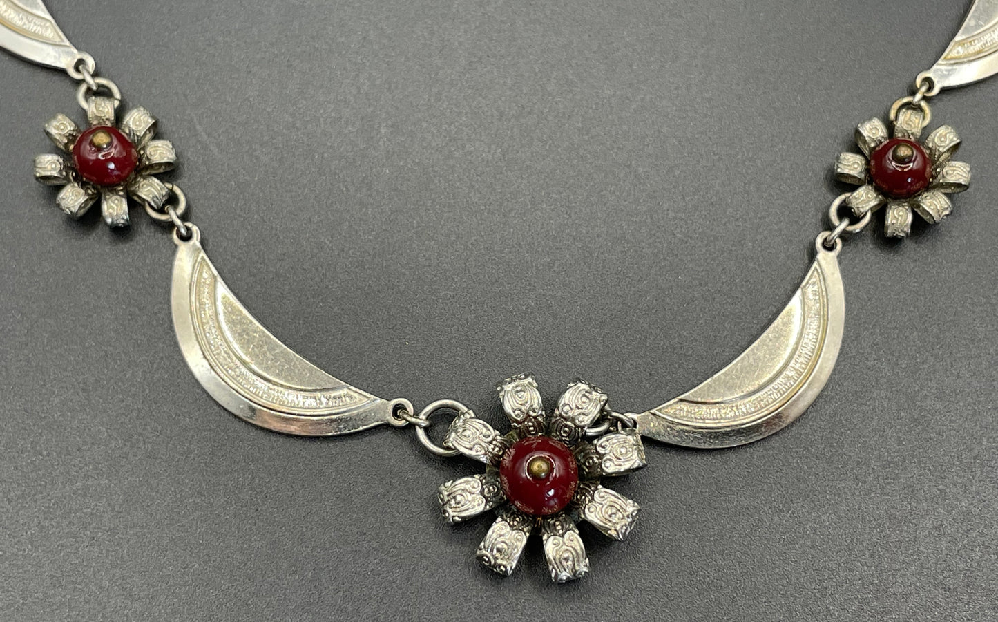 Vintage Louis Rousselet Art Deco machine age silver tone / chrome and dark red glass bead flower design necklace