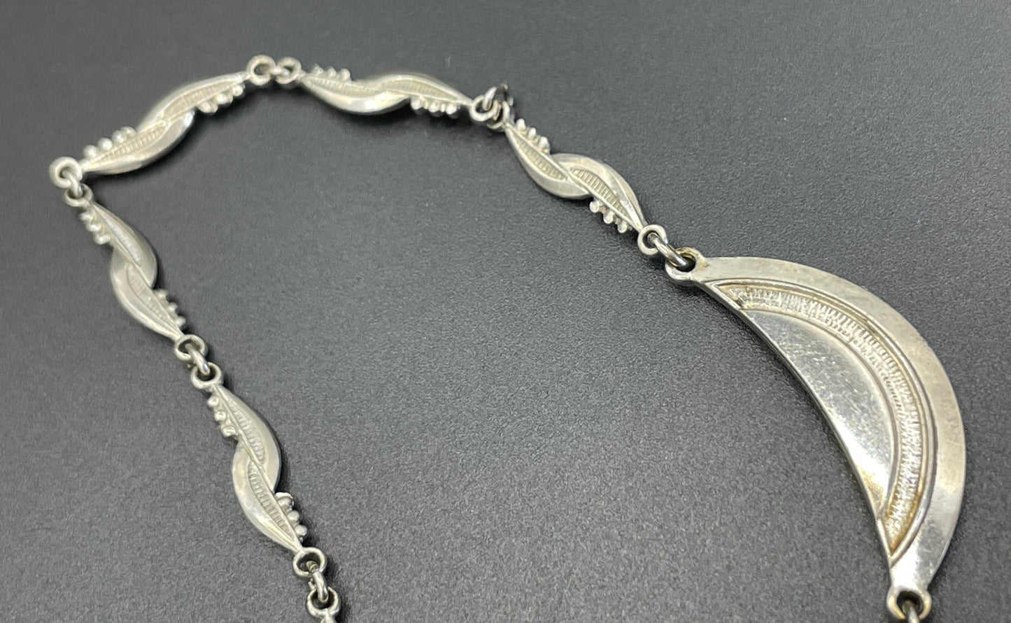 Vintage Louis Rousselet Art Deco machine age silver tone / chrome and dark red glass bead flower design necklace