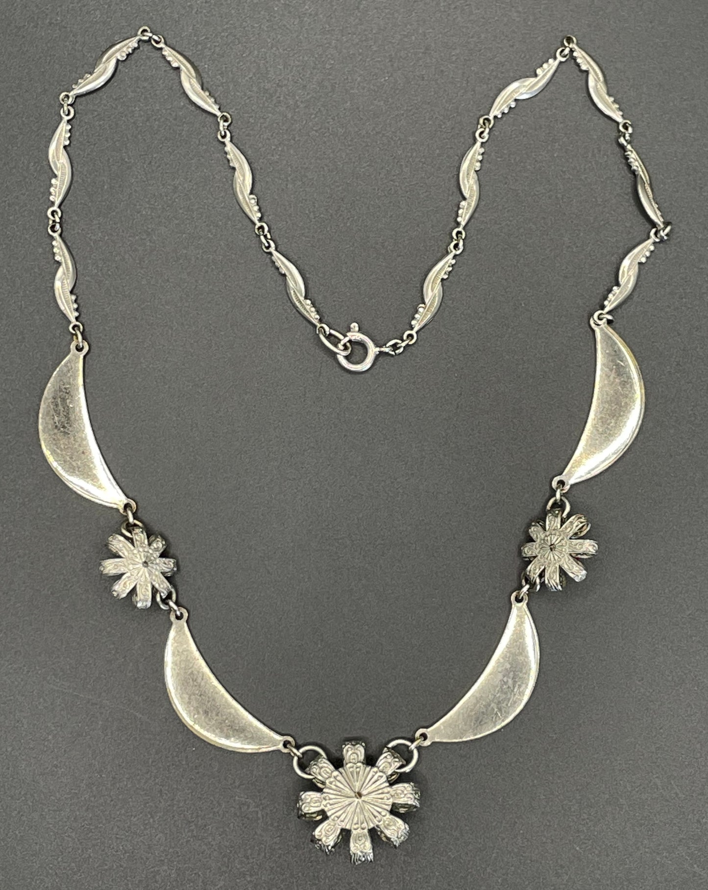 Vintage Louis Rousselet Art Deco machine age silver tone / chrome and dark red glass bead flower design necklace