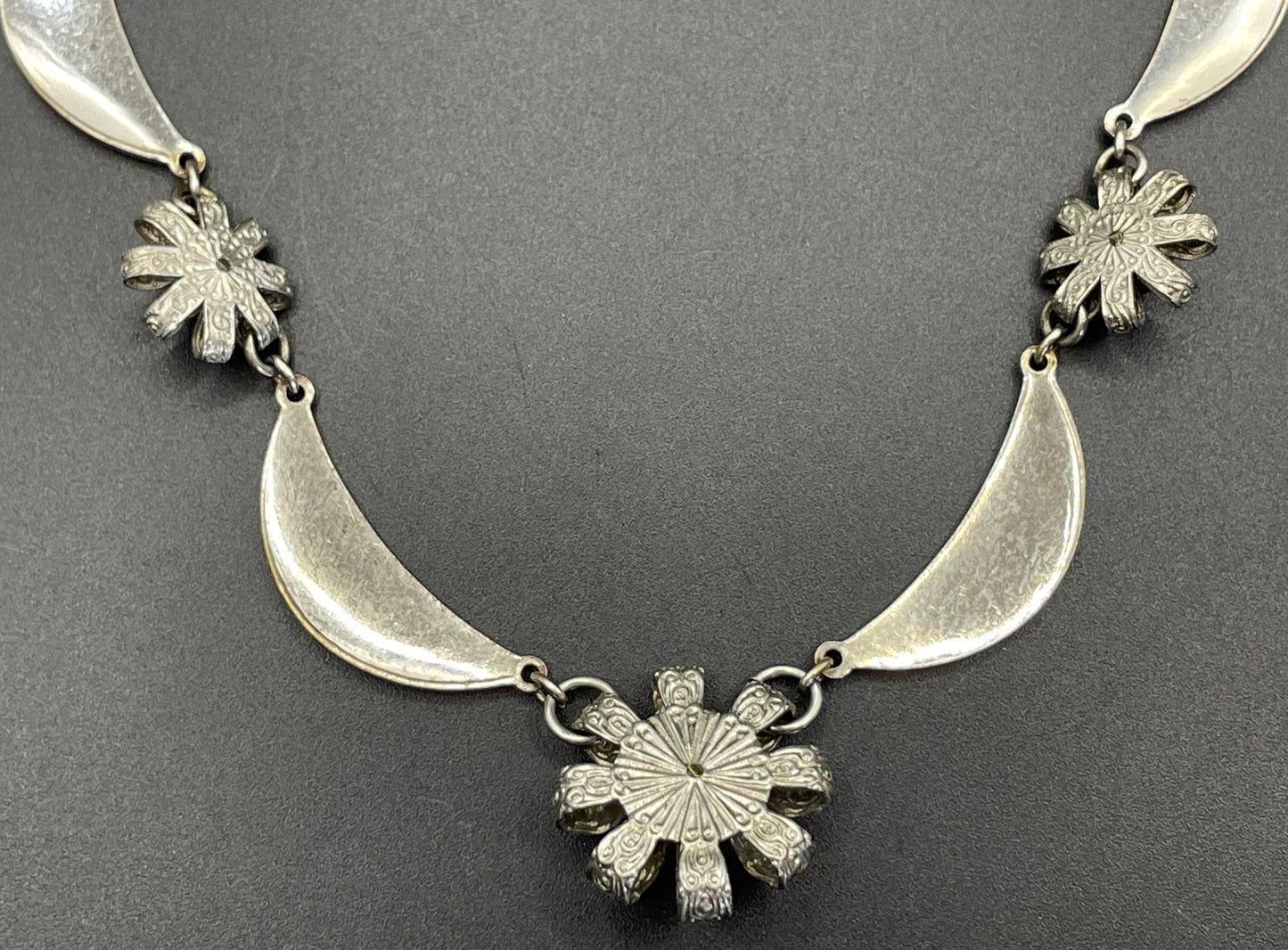 Vintage Louis Rousselet Art Deco machine age silver tone / chrome and dark red glass bead flower design necklace