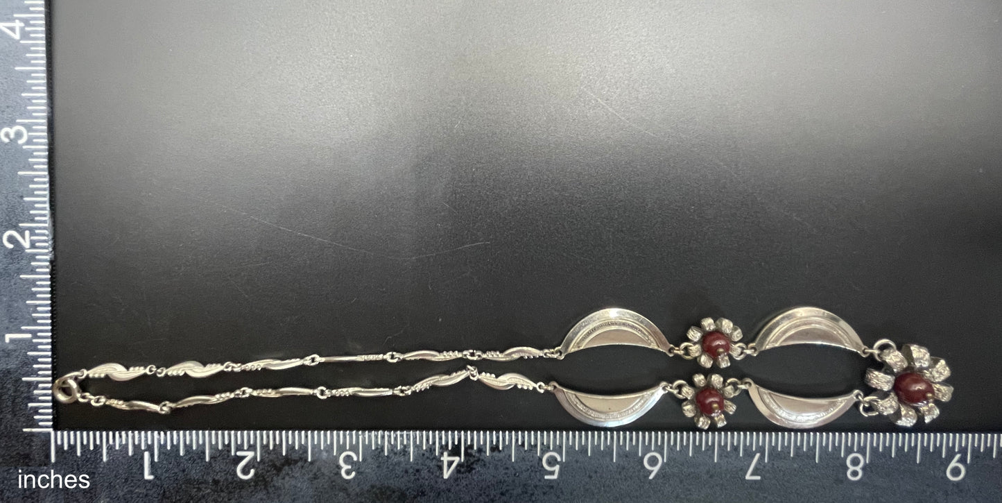 Vintage Louis Rousselet Art Deco machine age silver tone / chrome and dark red glass bead flower design necklace
