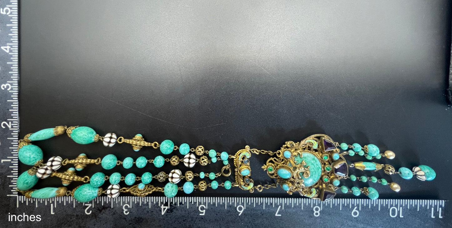 Vintage Neiger brothers long flapper necklace with ornate beads, enamel and lariat panels, green 'Peking' glass, green & purple rhinestones