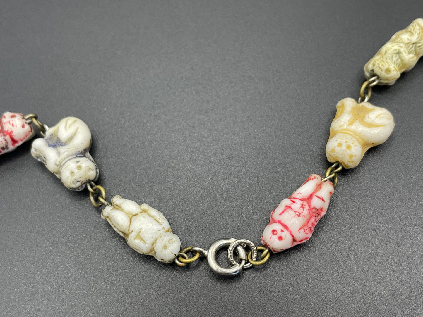 Vintage moulded 'custard' glass animal, bird, butterfly, fish & people shaped beaded necklace, rare Czech pressed glass with UV sensitivity