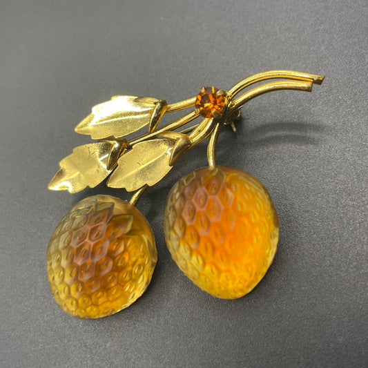 Vintage Austrian crystal bi-colour moulded glass fruit brooch in gold tone with citrine yellow and topaz orange colours