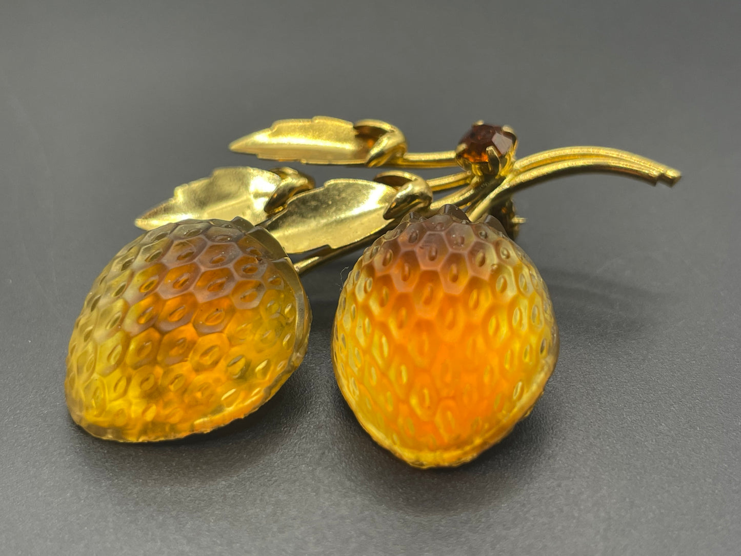 Vintage Austrian crystal bi-colour moulded glass fruit brooch in gold tone with citrine yellow and topaz orange colours