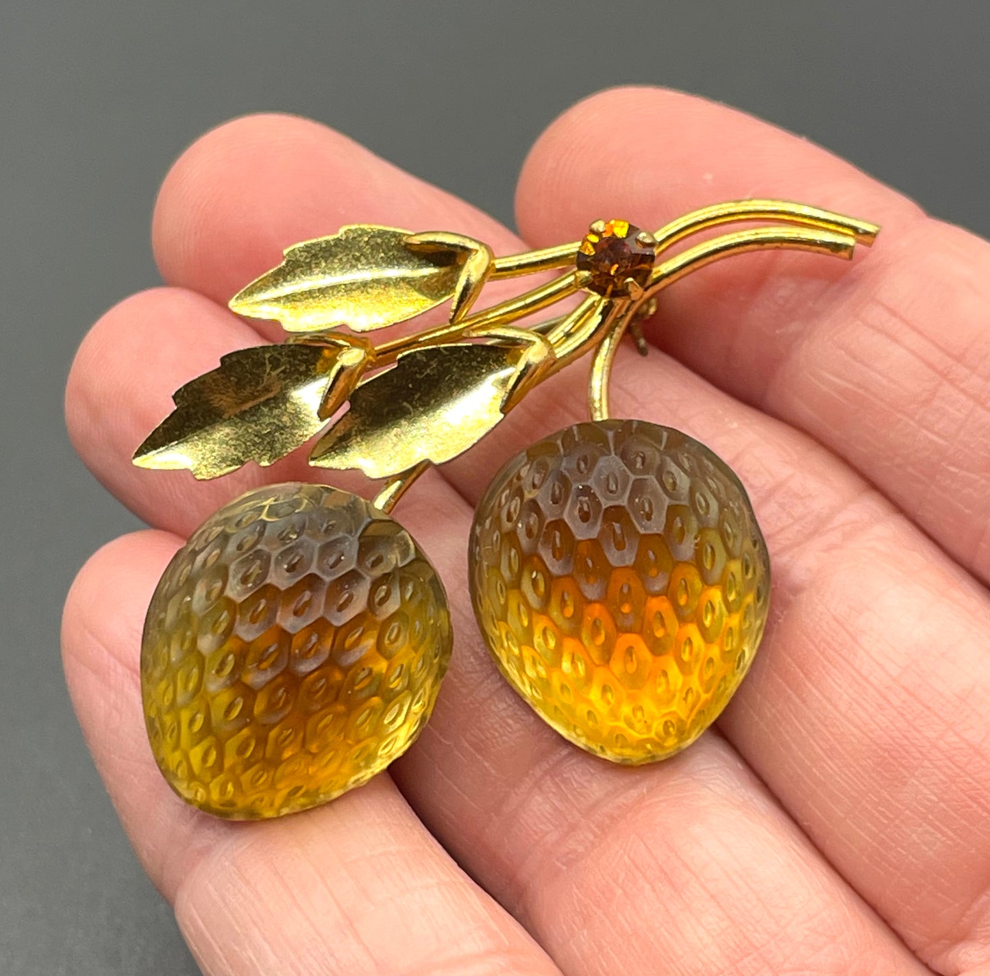 Vintage Austrian crystal bi-colour moulded glass fruit brooch in gold tone with citrine yellow and topaz orange colours