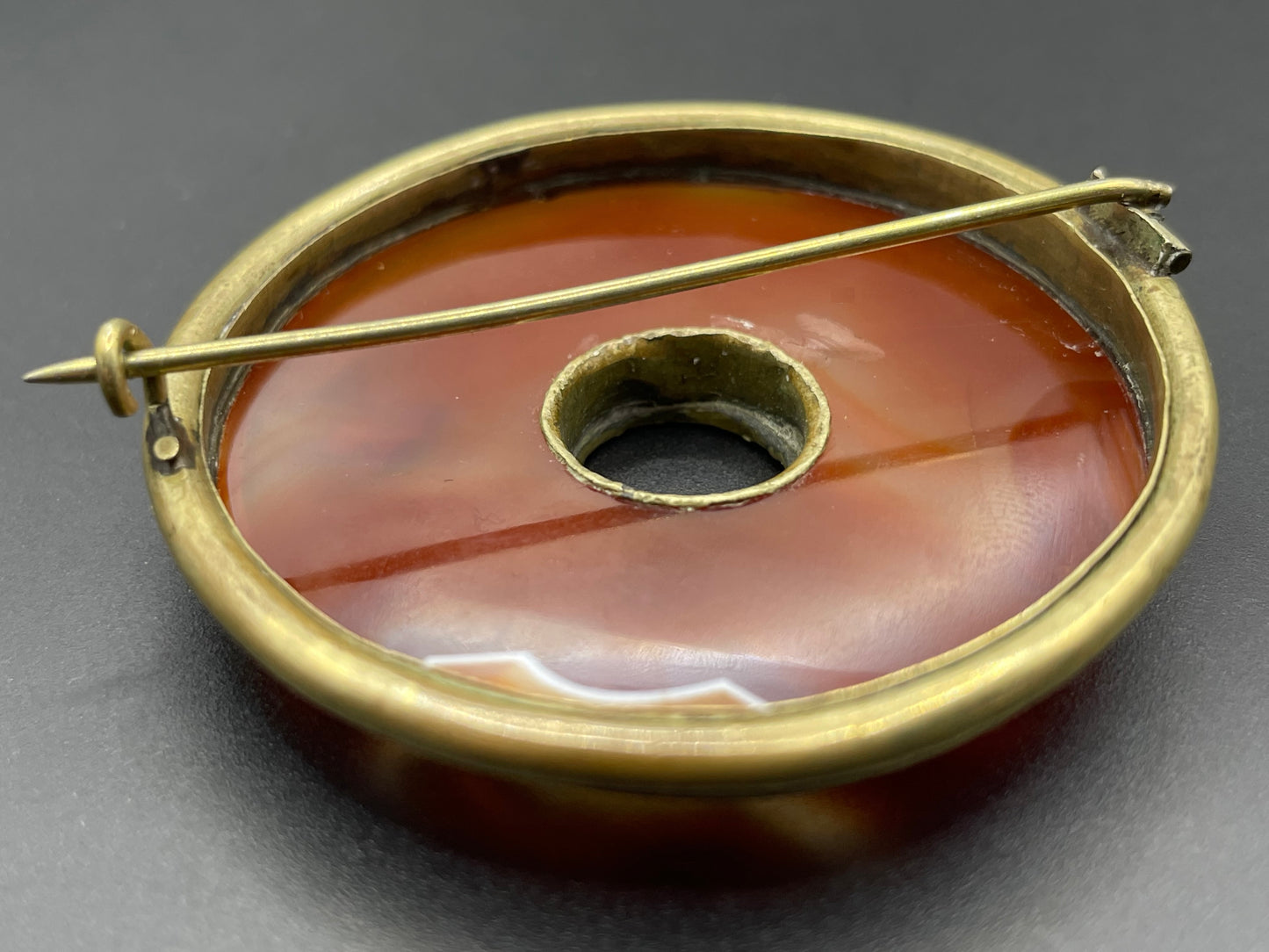 Large antique Victorian Scottish carnelian agate and gold tone circular ring brooch pin, beautiful orange stone