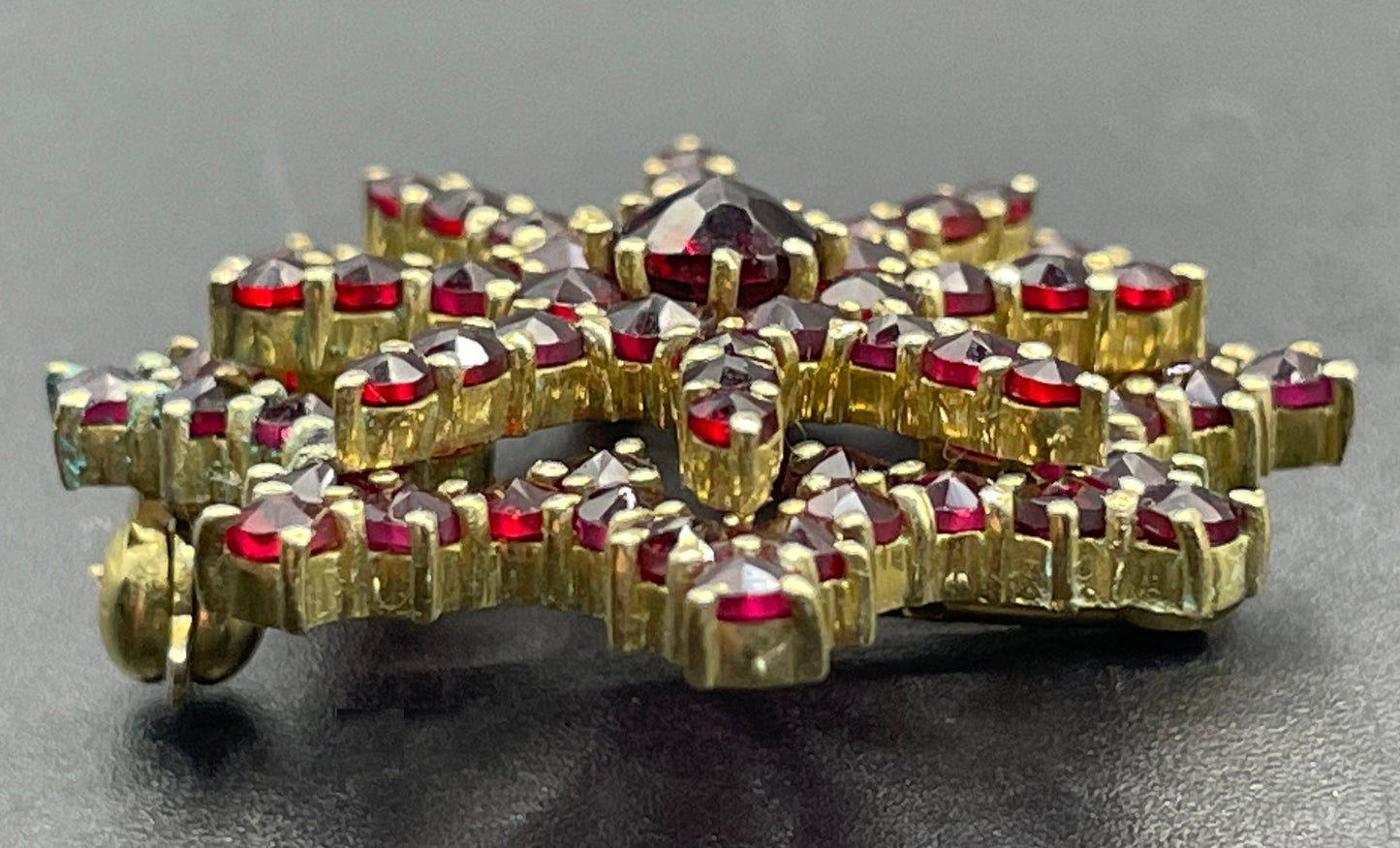 Vintage / antique Bohemian garnet floral star shaped brooch, rose cut stones set in gold tone, possibly gold, gold plated or tombac