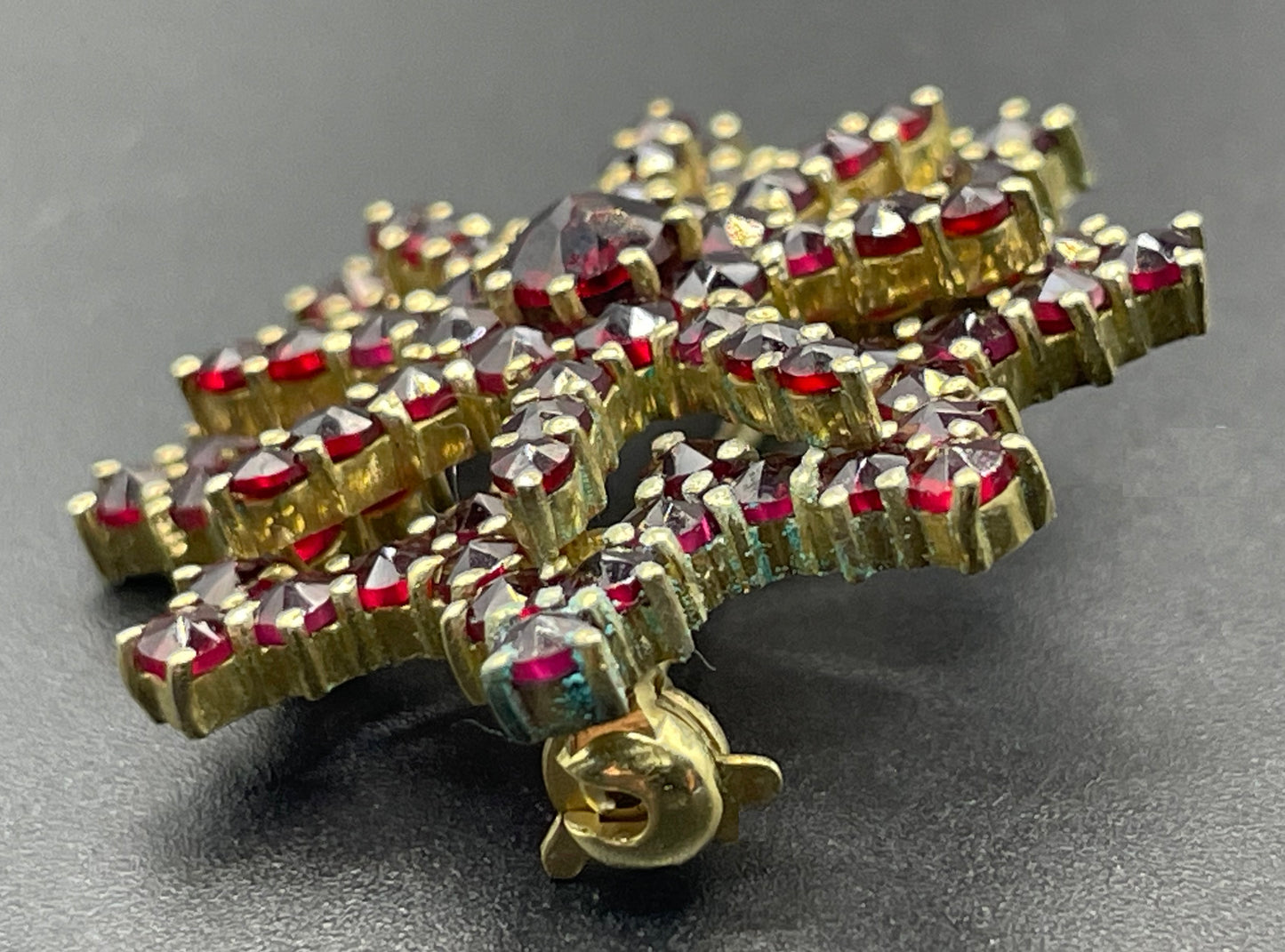 Vintage / antique Bohemian garnet floral star shaped brooch, rose cut stones set in gold tone, possibly gold, gold plated or tombac