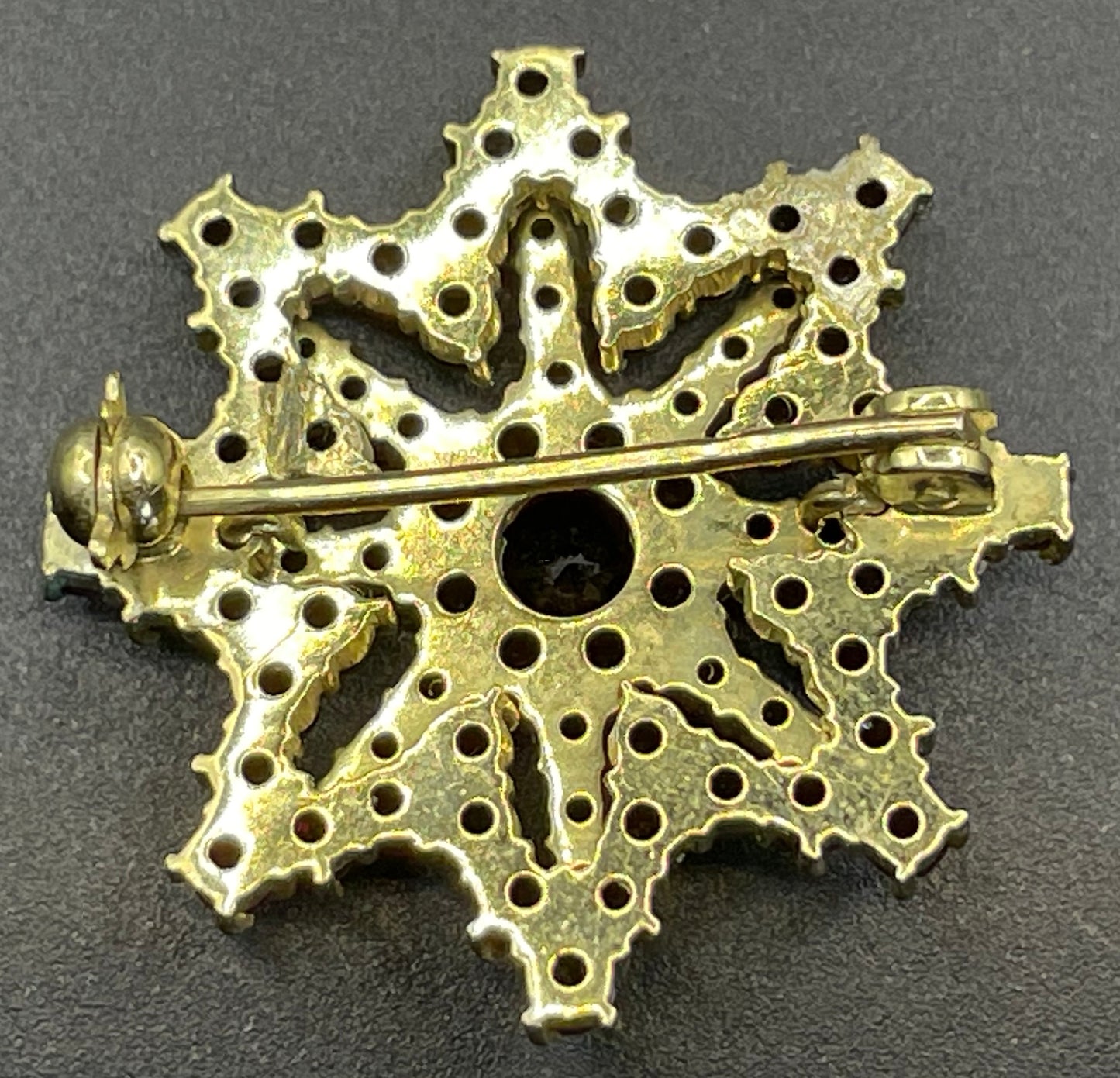 Vintage / antique Bohemian garnet floral star shaped brooch, rose cut stones set in gold tone, possibly gold, gold plated or tombac