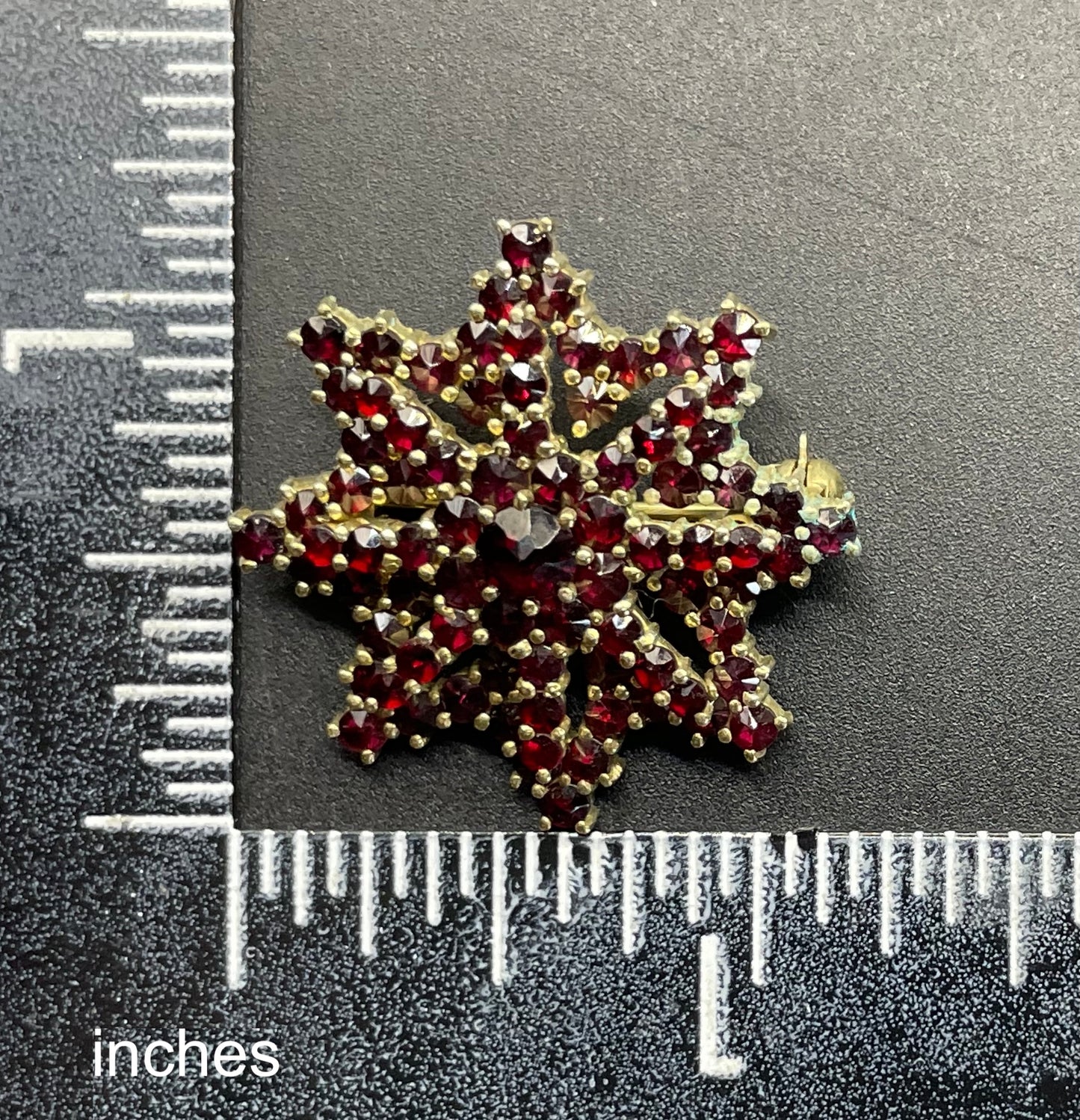 Vintage / antique Bohemian garnet floral star shaped brooch, rose cut stones set in gold tone, possibly gold, gold plated or tombac