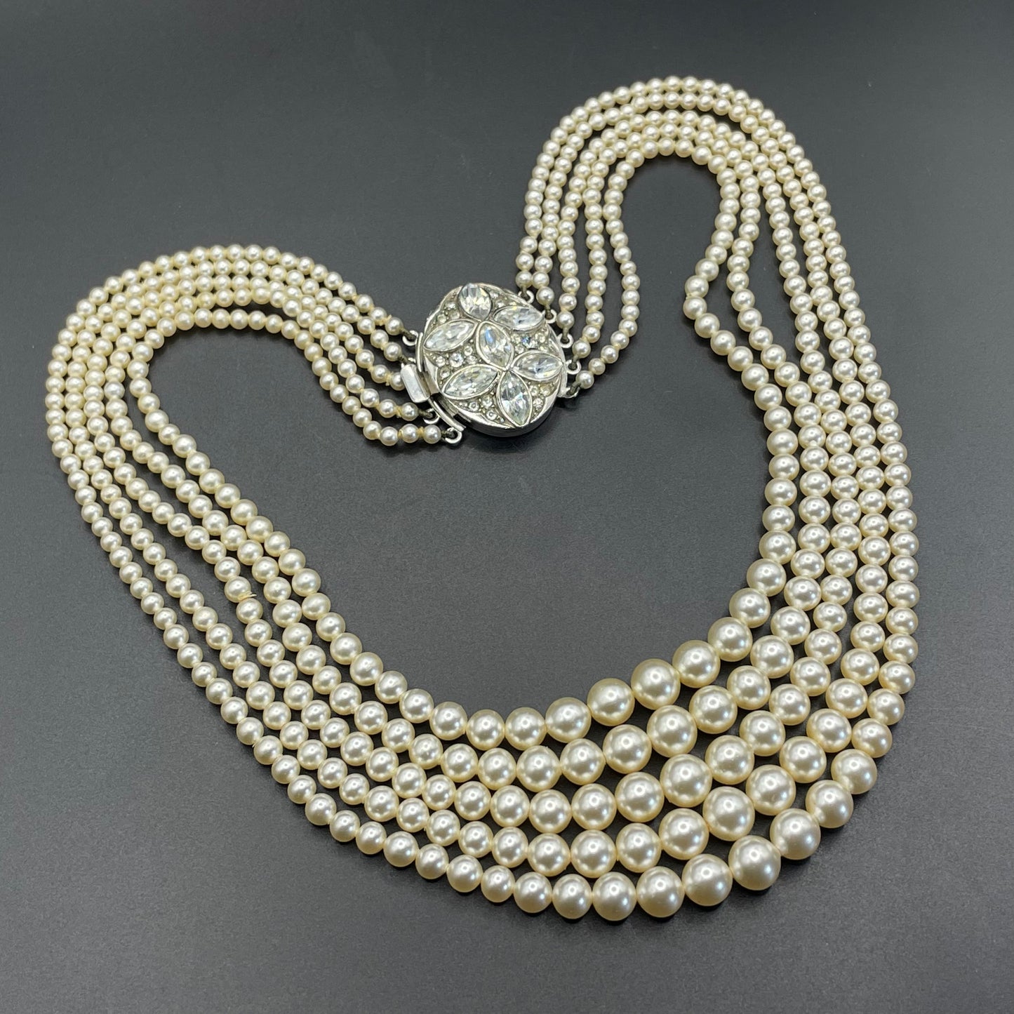 Vintage five strand glass faux pearl necklace with ornate clear rhinestone box clasp, graduated glass pearls