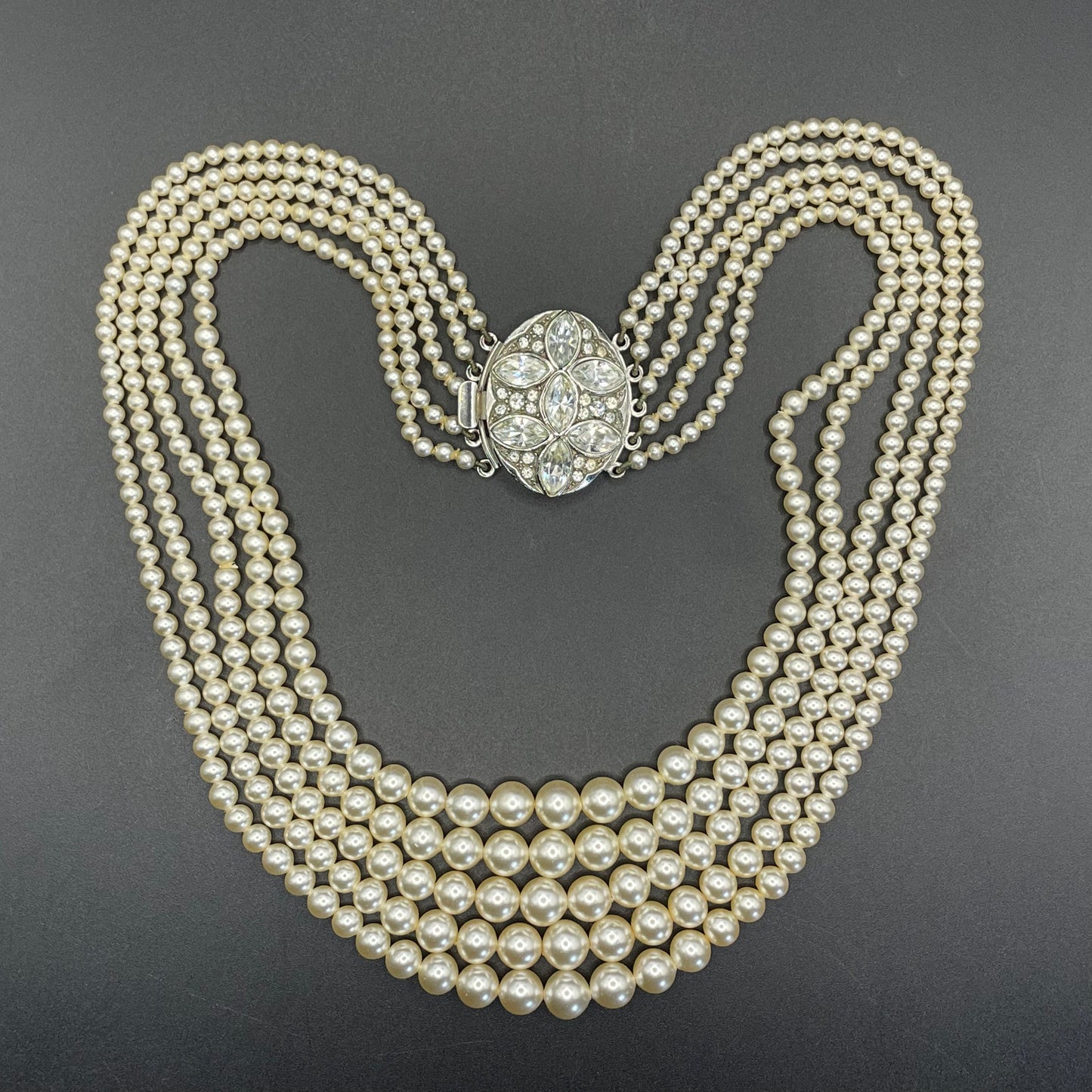 Vintage five strand glass faux pearl necklace with ornate clear rhinestone box clasp, graduated glass pearls