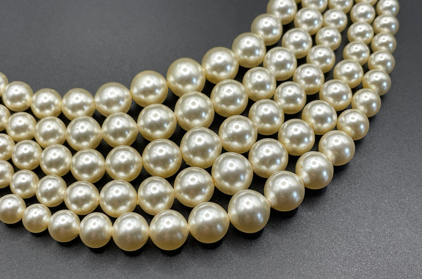 Vintage five strand glass faux pearl necklace with ornate clear rhinestone box clasp, graduated glass pearls