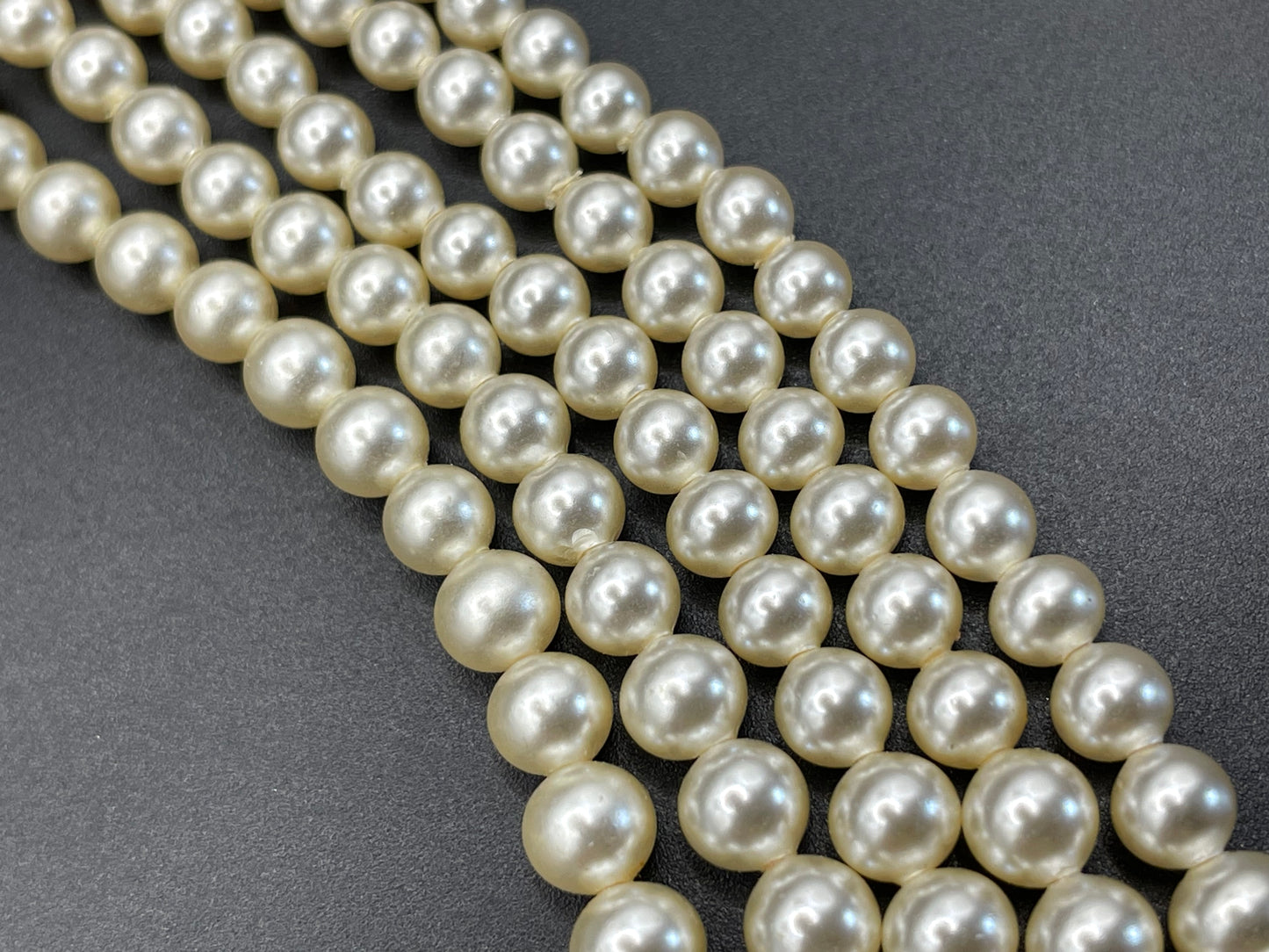 Vintage five strand glass faux pearl necklace with ornate clear rhinestone box clasp, graduated glass pearls