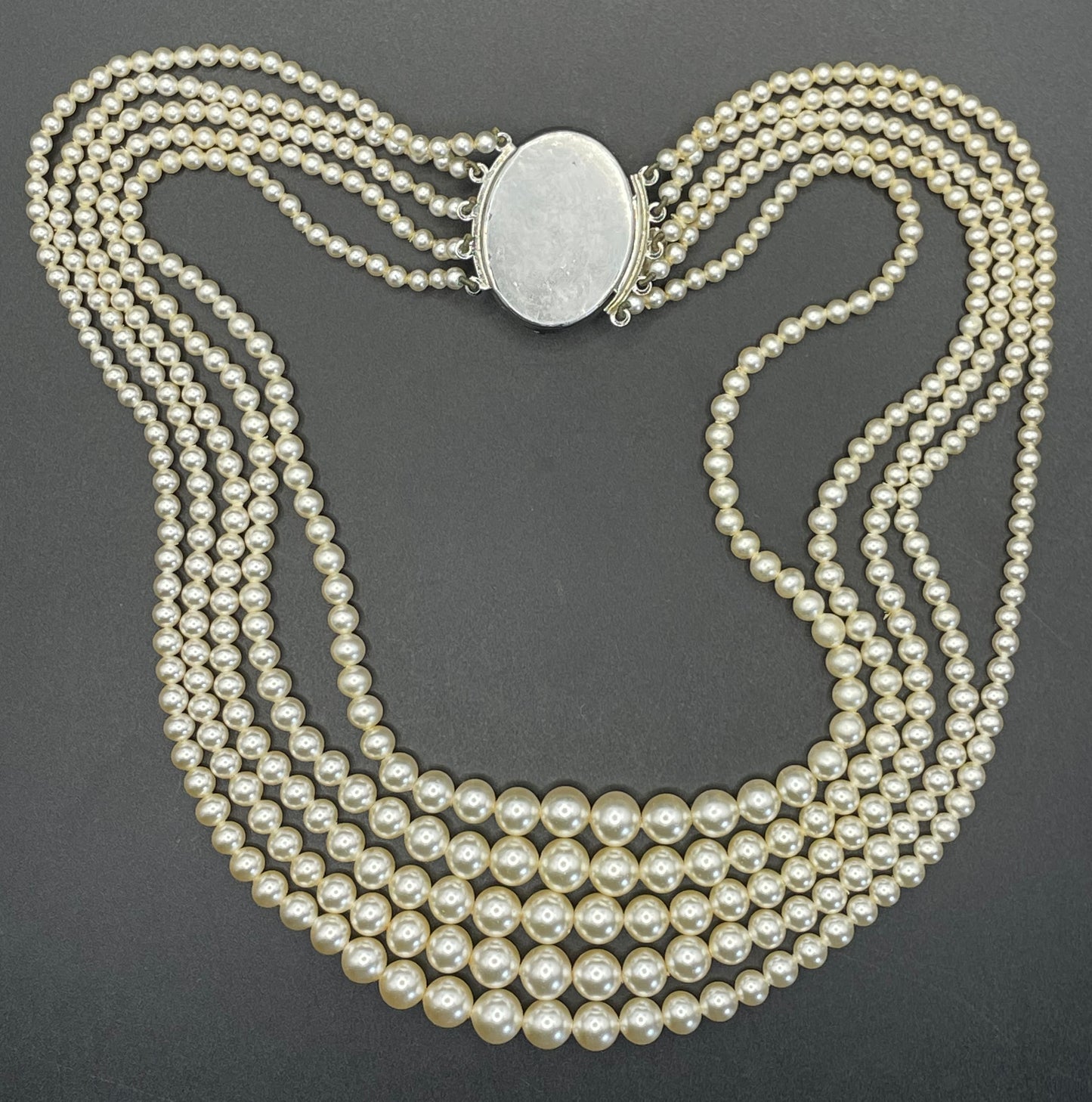 Vintage five strand glass faux pearl necklace with ornate clear rhinestone box clasp, graduated glass pearls