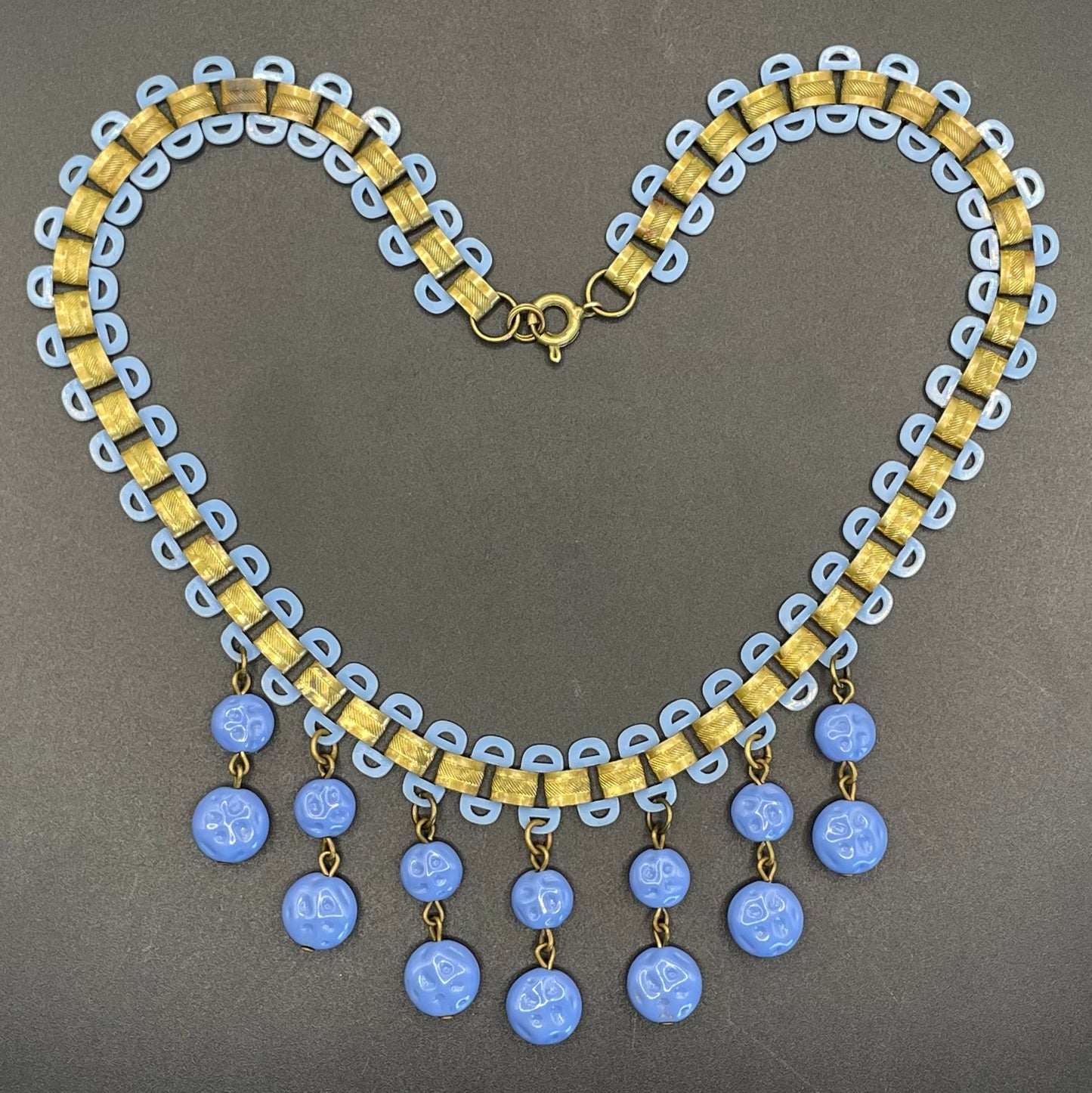 Beautiful vintage bookchain style blue poured glass bead and early plastic with gold tone fringe necklace, Art Deco, Miriam Haskell style