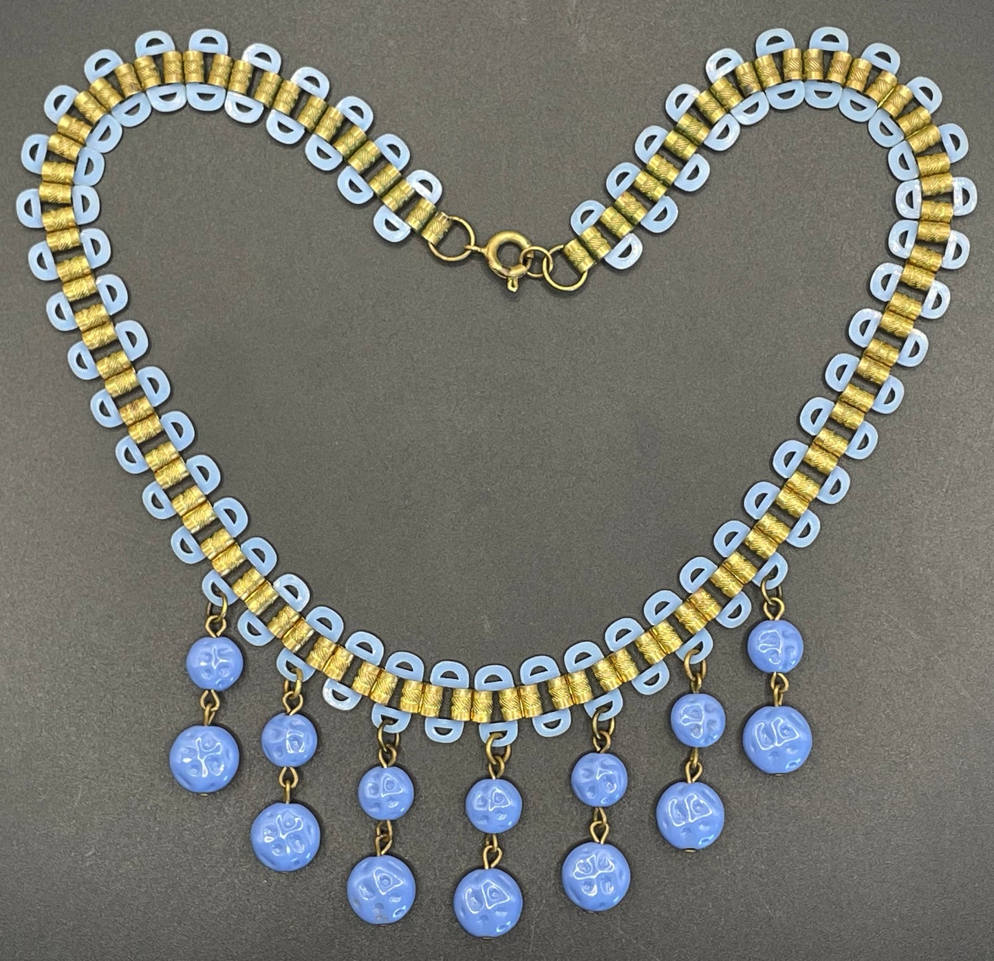Beautiful vintage bookchain style blue poured glass bead and early plastic with gold tone fringe necklace, Art Deco, Miriam Haskell style