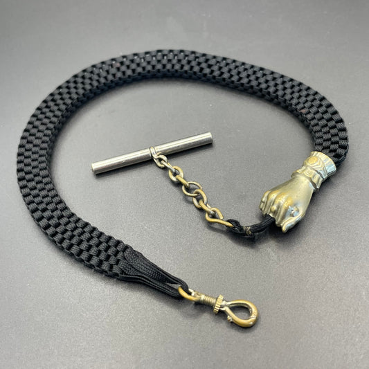 Antique Victorian black woven Abertina watch chain with hand motif and T bar