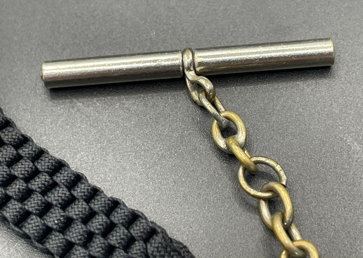 Antique Victorian black woven Abertina watch chain with hand motif and T bar