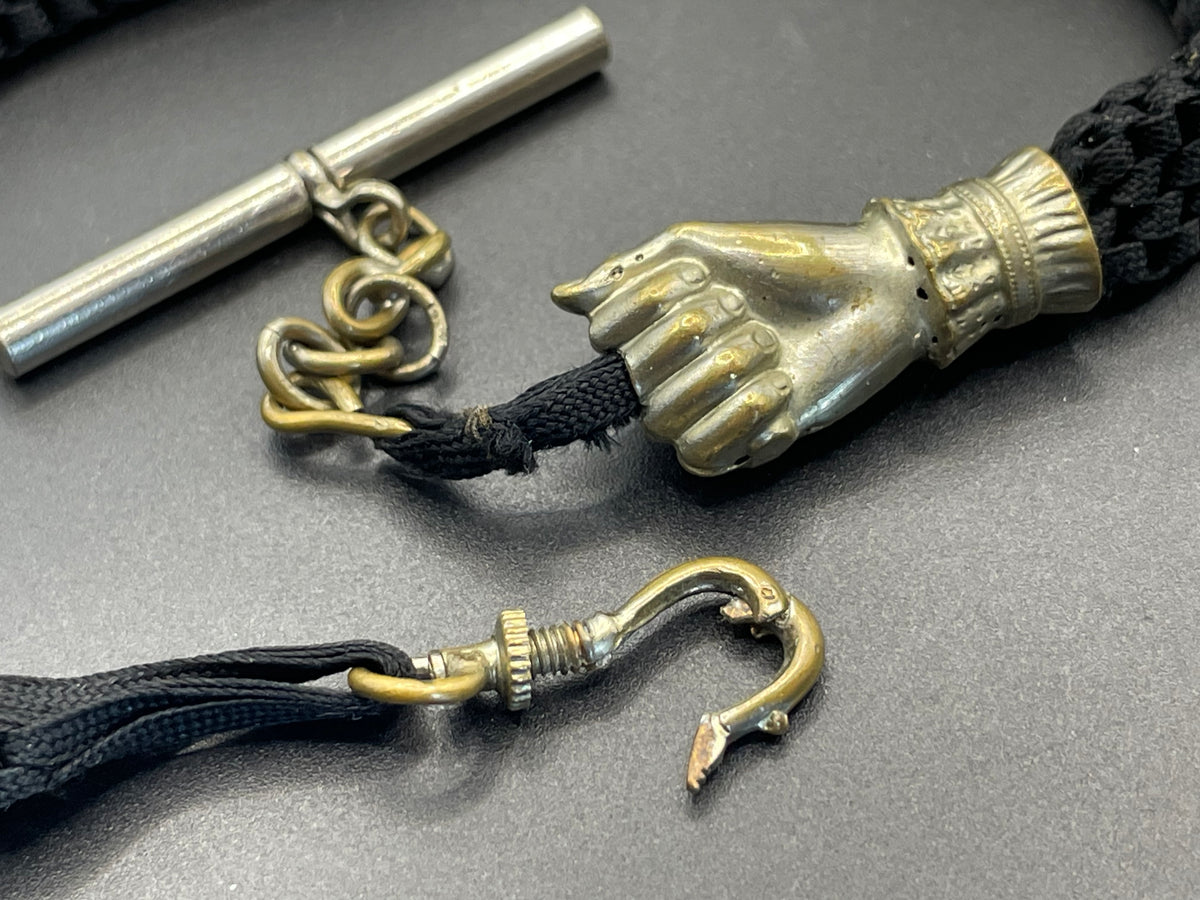 Antique Victorian black woven Abertina watch chain with hand motif and T bar