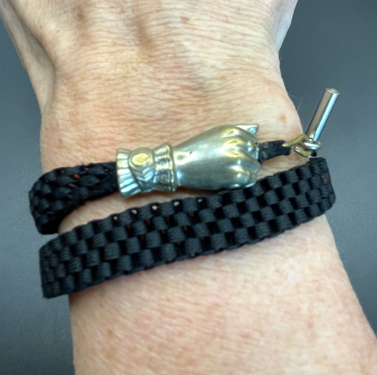 Antique Victorian black woven Abertina watch chain with hand motif and T bar