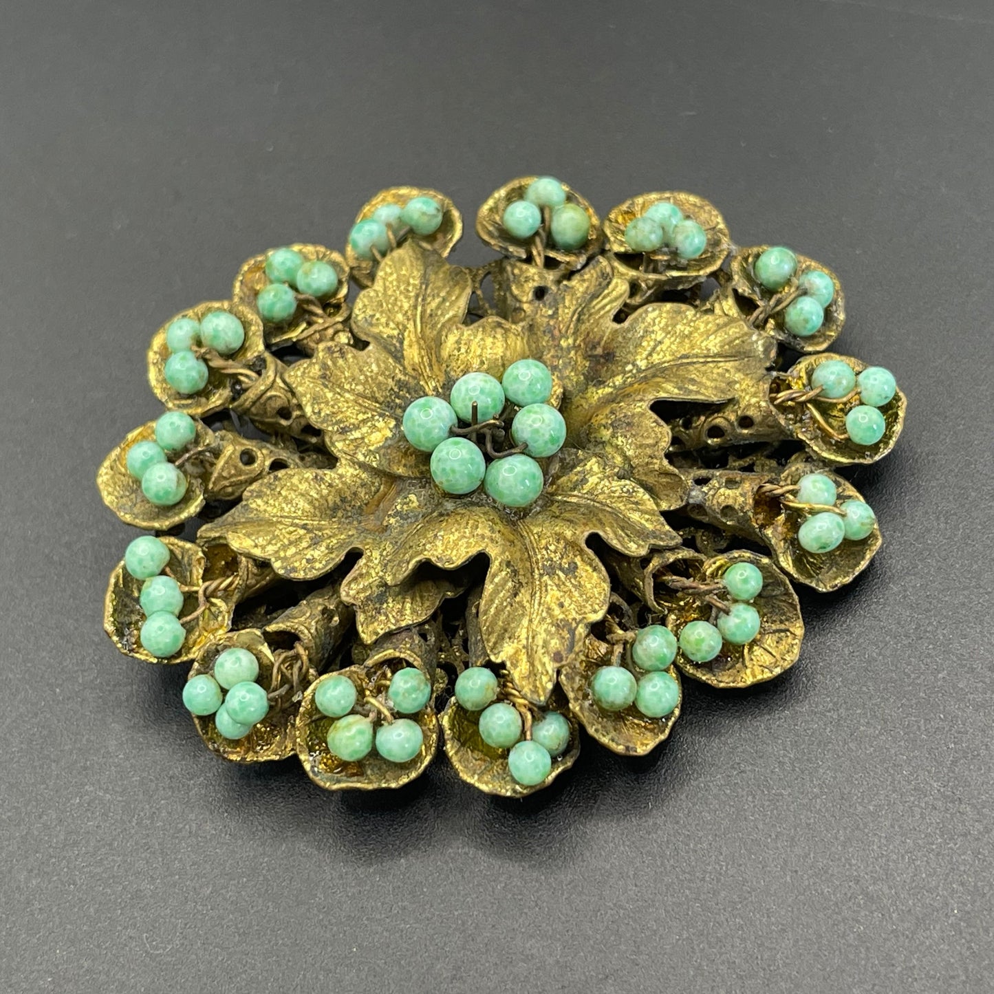 Large Neiger vintage brooch - green coloured glass wired beads and pretty gold tone leaf design, filigree back