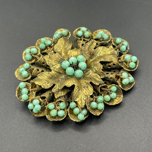 Large Neiger vintage brooch - green coloured glass wired beads and pretty gold tone leaf design, filigree back