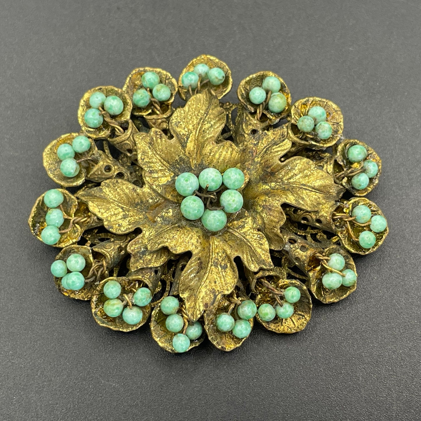 Large Neiger vintage brooch - green coloured glass wired beads and pretty gold tone leaf design, filigree back
