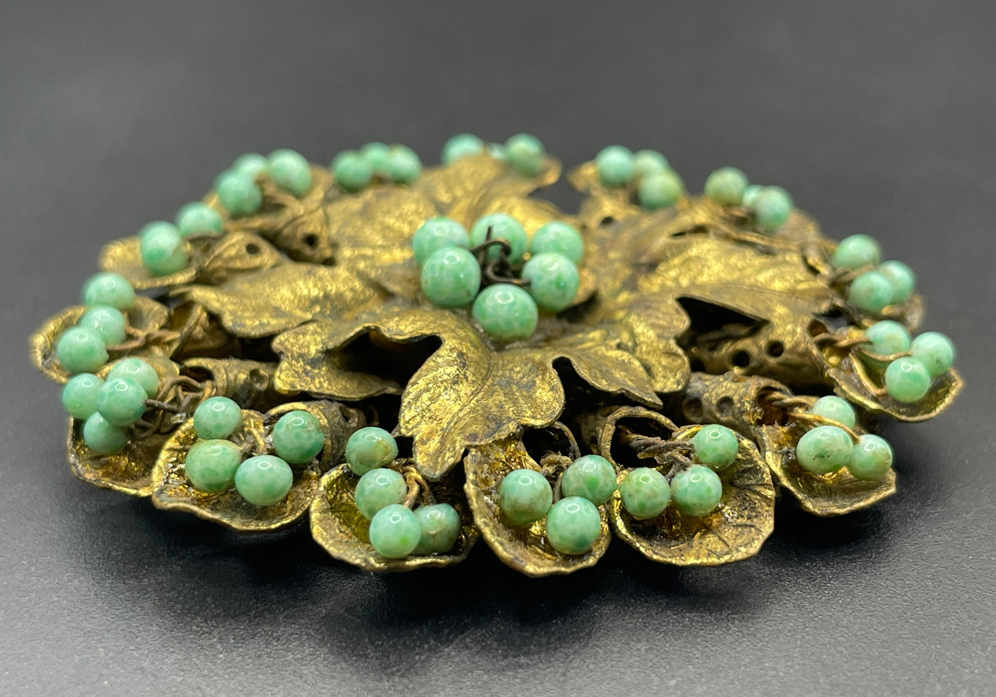 Large Neiger vintage brooch - green coloured glass wired beads and pretty gold tone leaf design, filigree back