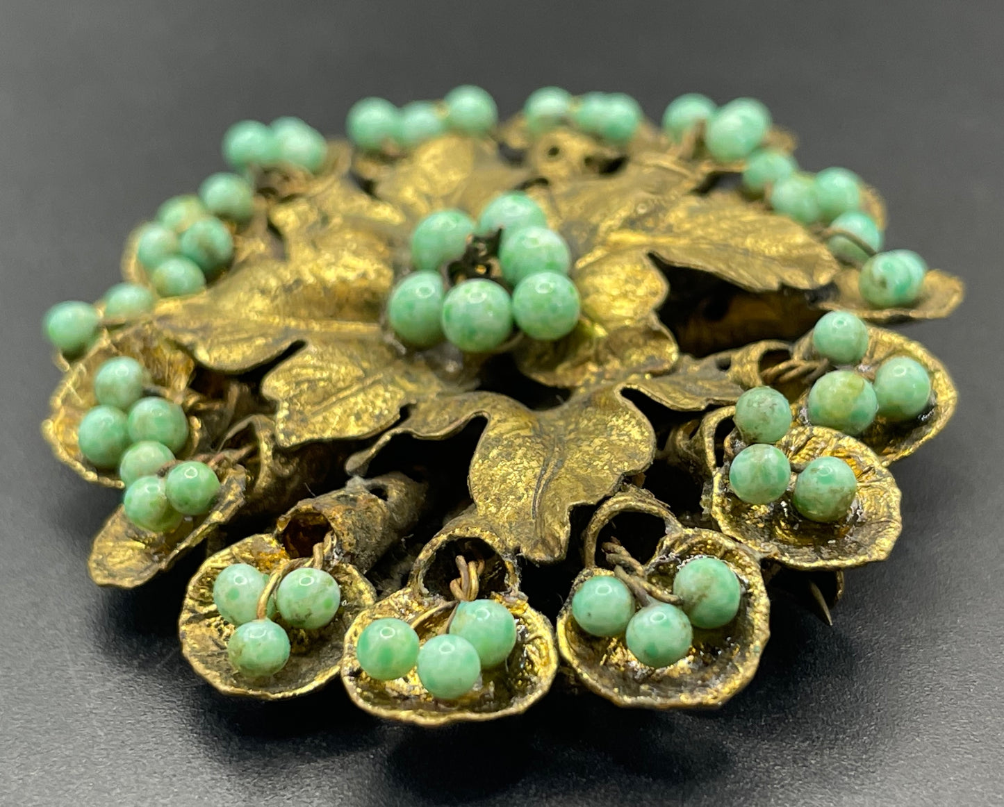 Large Neiger vintage brooch - green coloured glass wired beads and pretty gold tone leaf design, filigree back